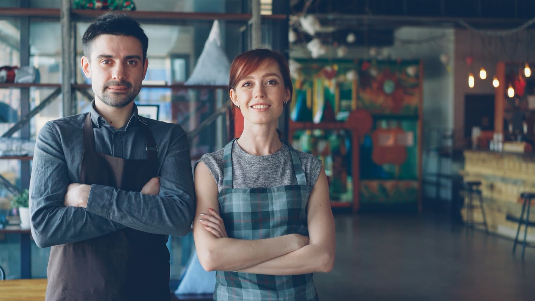 Restaurant owners standing together